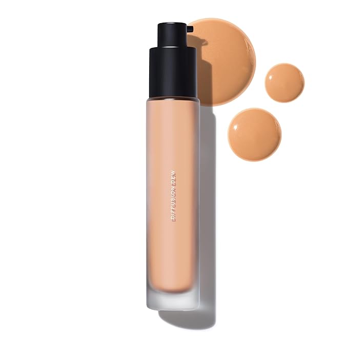 MAKE Beauty Diffusion Dew Skin Tint. Sheer to Medium Coverage Radiant Finish. Blurring, Smoothing, and Brightening for Glowing Complexion. Enhanced with Niacinamide and Adenosine. Tan 06